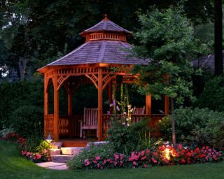 traditional wooden gazebo with lights