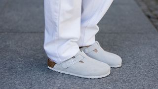 Anna Winter is seen wearing white pants Levi’s, grey shoes Birkenstock on May 02, 2024 in Berlin, Germany