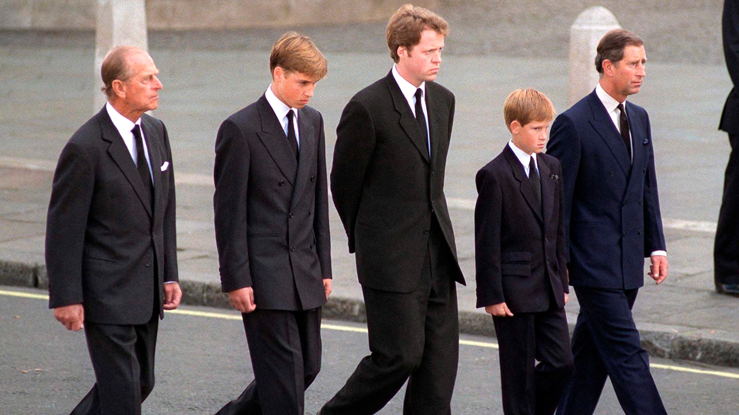 Prince Philip, Prince William, Prince Harry, Earl Spencer and King Charles walk together on the day of Princess Diana's funeral