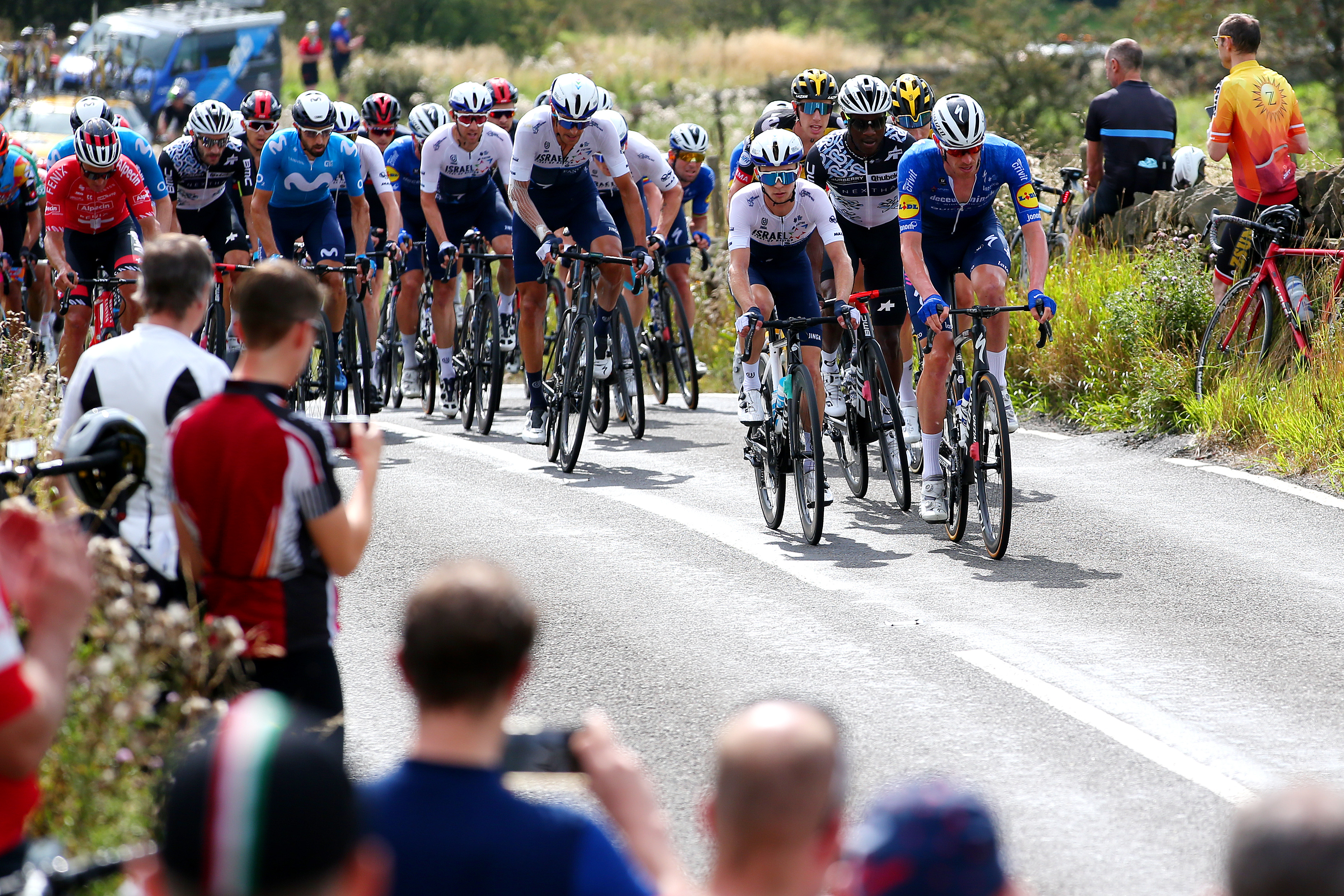(L-R) Mattia Cattaneo of Italy and Team Quick-Step - Alpha Vinyl and Mason Hollyman of United Kingdom and Team Israel - Premier Tech compete in the breakaway during the 36th Settimana Internazionale Coppi e Bartali 2022 - Stage 3 a 147,1km stage from San Marino to San Marino 648m / #CoppieBartali / on March 24, 2022 in San Marino, Italy. (Photo by Dario Belingheri/Getty Images)