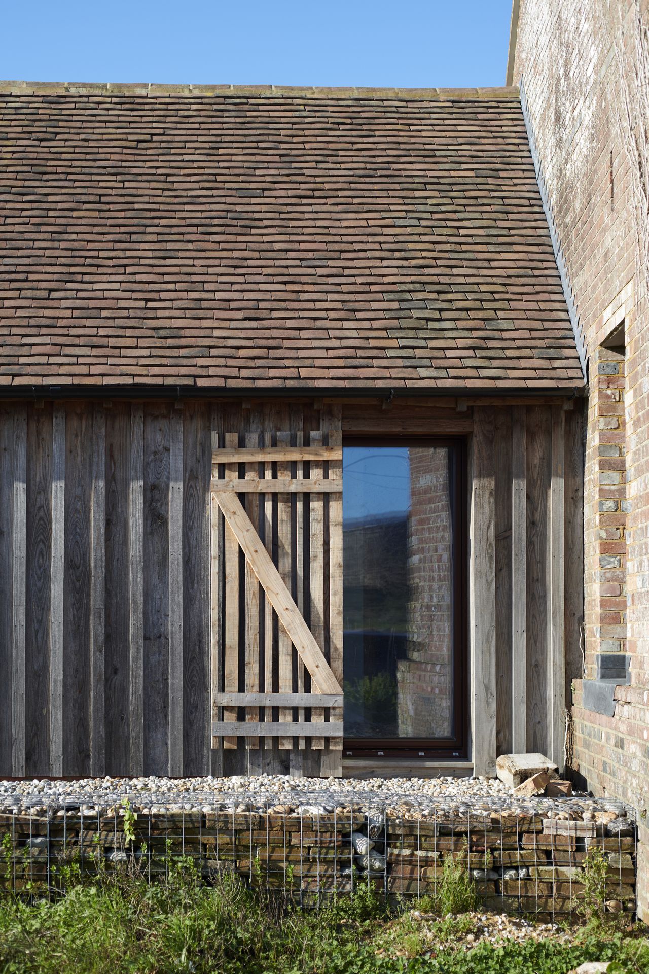 The original opening were retained and used to bring natural light into the home