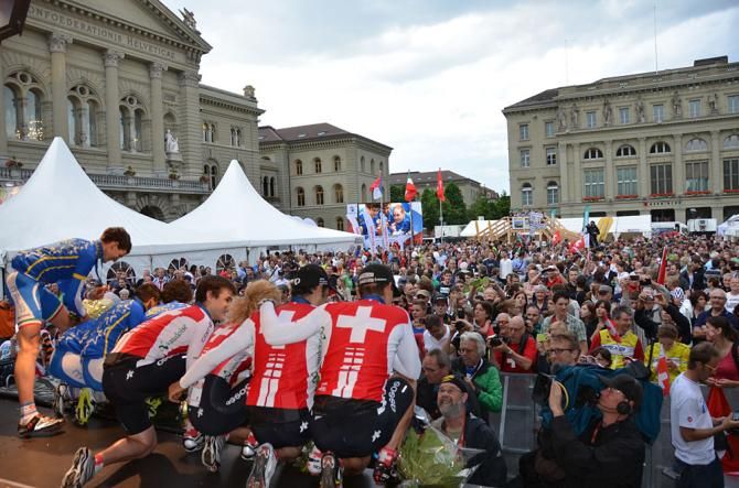 The Swiss team awaits the start of the team relay