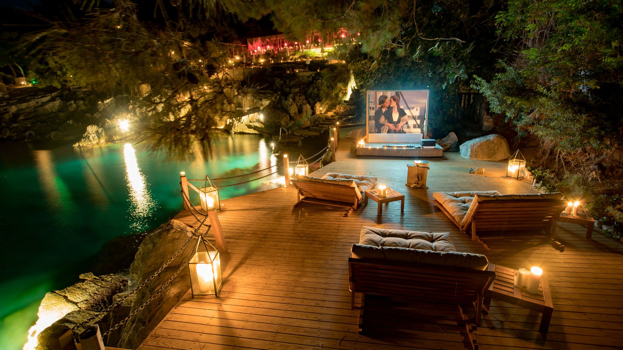 Astrology travel experience at Perdue in Turkey, with guests watching a film under the stars.