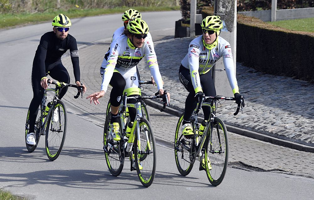 Italian Filippo Pozzato of Southeast-Venezuela (C) practices during a track reconnaissance, on April 1, 2016, ahead of the Tour of Flanders