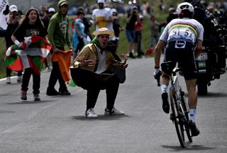Team Deceuninck Quicksteps Julian Alaphilippe of France R climbs the Tourmalet pass during the 18th stage of the 108th edition of the Tour de France cycling race 129 km between Pau and Luz Ardiden on July 15 2021 Photo by AnneChristine POUJOULAT AFP Photo by ANNECHRISTINE POUJOULATAFP via Getty Images