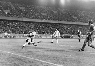 Liverpool's Alan Kennedy, right, scores the only goal in the 1981 European Cup final in Paris