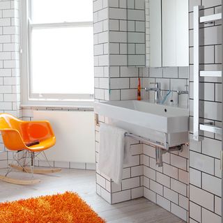 bathroom with white tiles