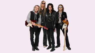 Alice Cooper original lineup holding guitars