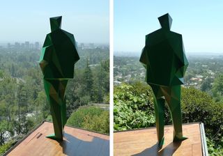 Different angles of the prismatic green figure