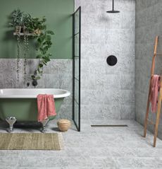 tiled bathroom with wet room shower