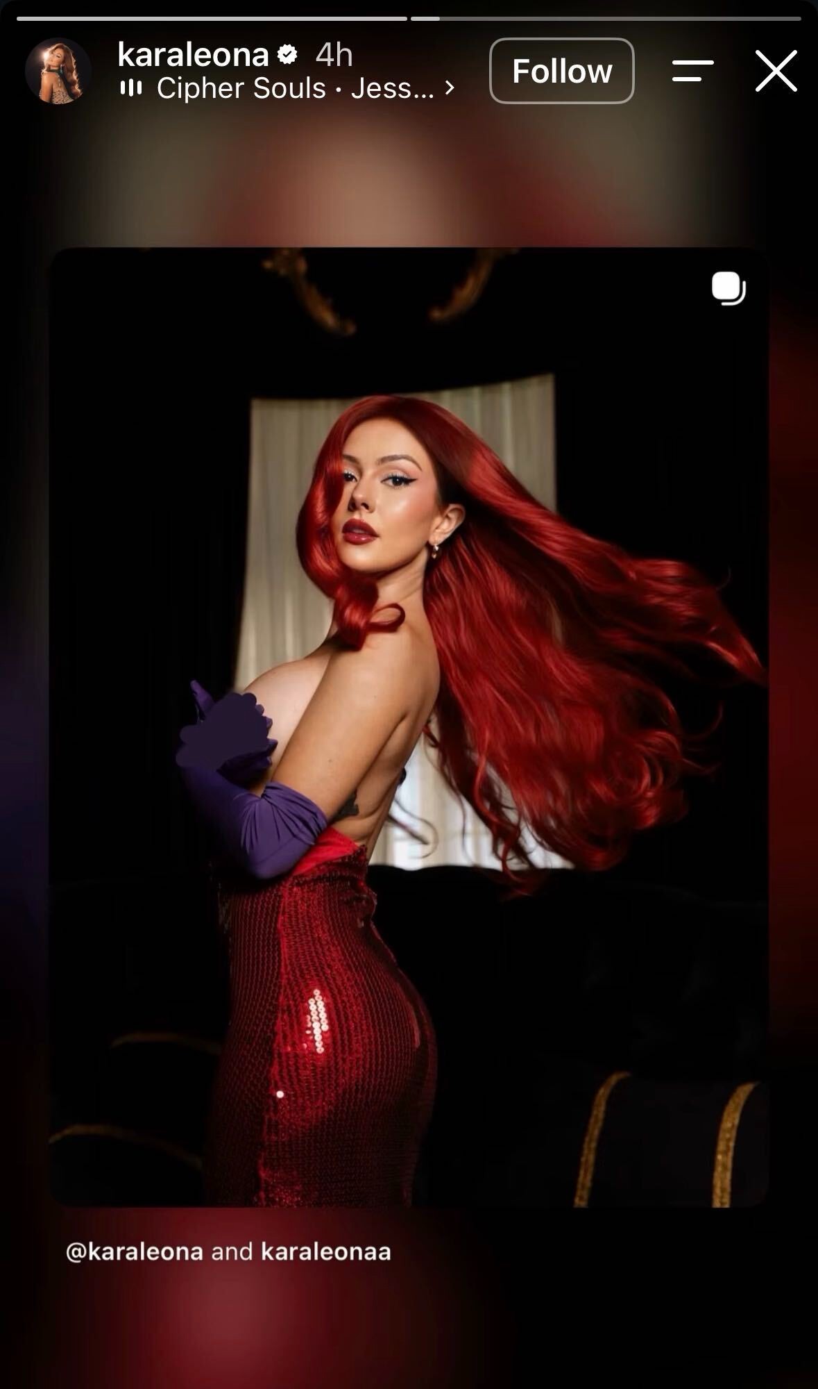 Kara Leona dressed as Jessica Rabbit and throwing her hair over her shoulder.