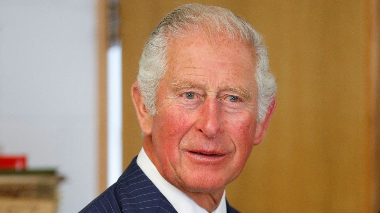 Prince Charles, Prince of Wales looks at products at Jodrell Laboratory at The Royal Botanic Gardens in Kew