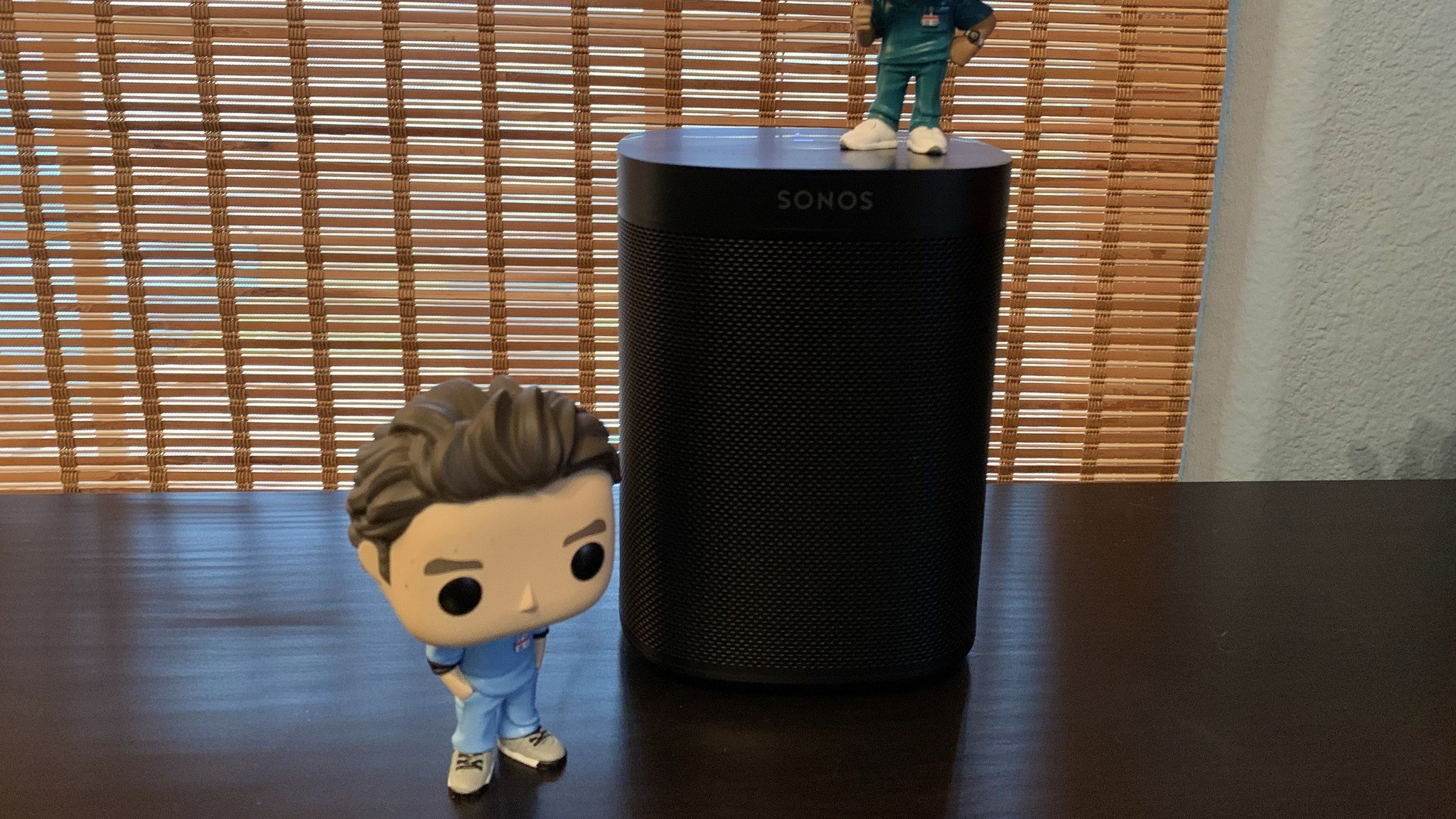 Sonos One with Funko pops on table