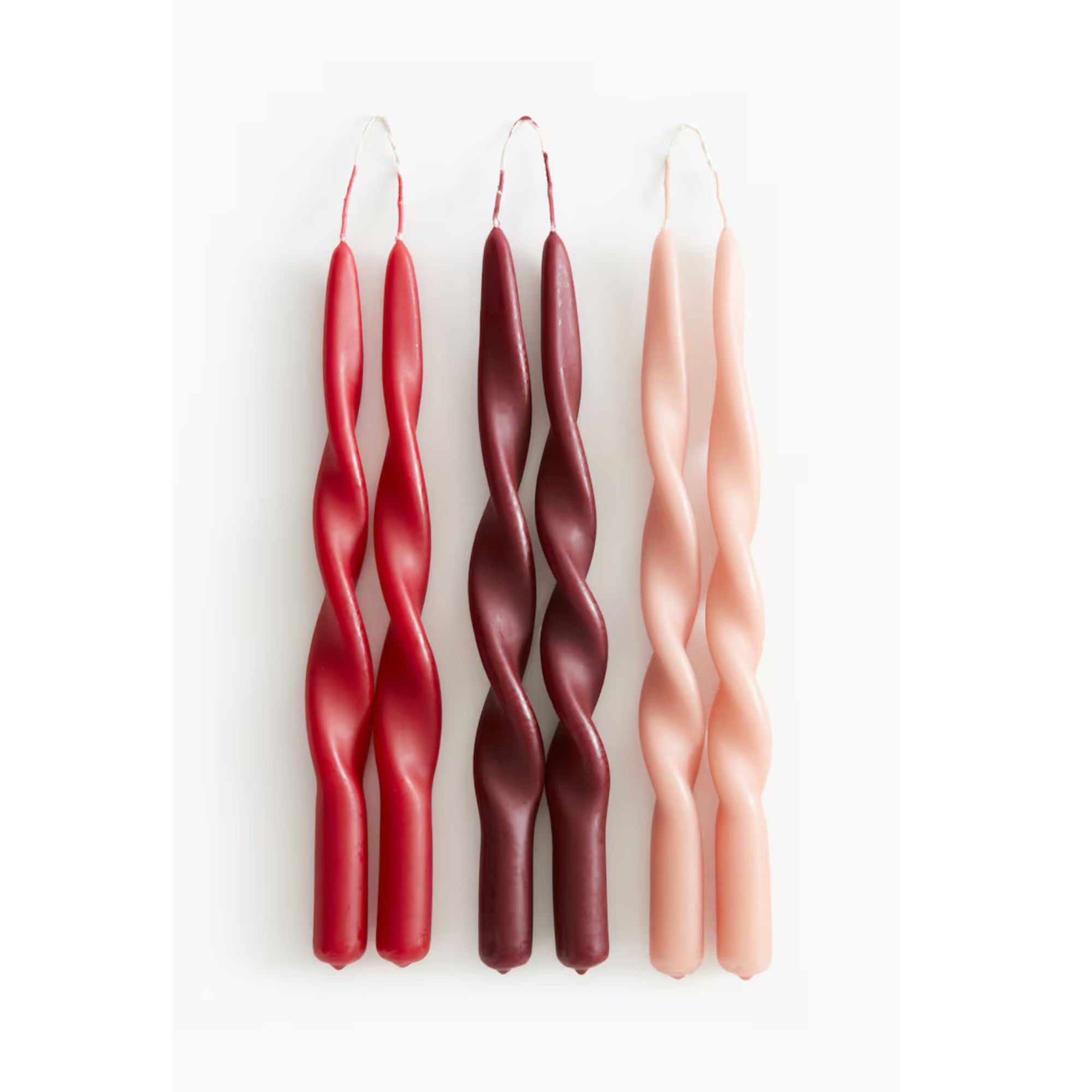 pink and red spiral candles