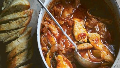 Tomato and fennel fish stew with garlic and oregano bread