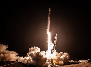 A SpaceX Falcon 9 rocket launches Argentina’s SAOCOM-1A radar-imaging satellite from California’s Vandenberg Air Force Station on Oct. 7, 2018. The rocket’s first stage came back to Earth for a landing at Vandenberg less than 8 minutes after liftoff.