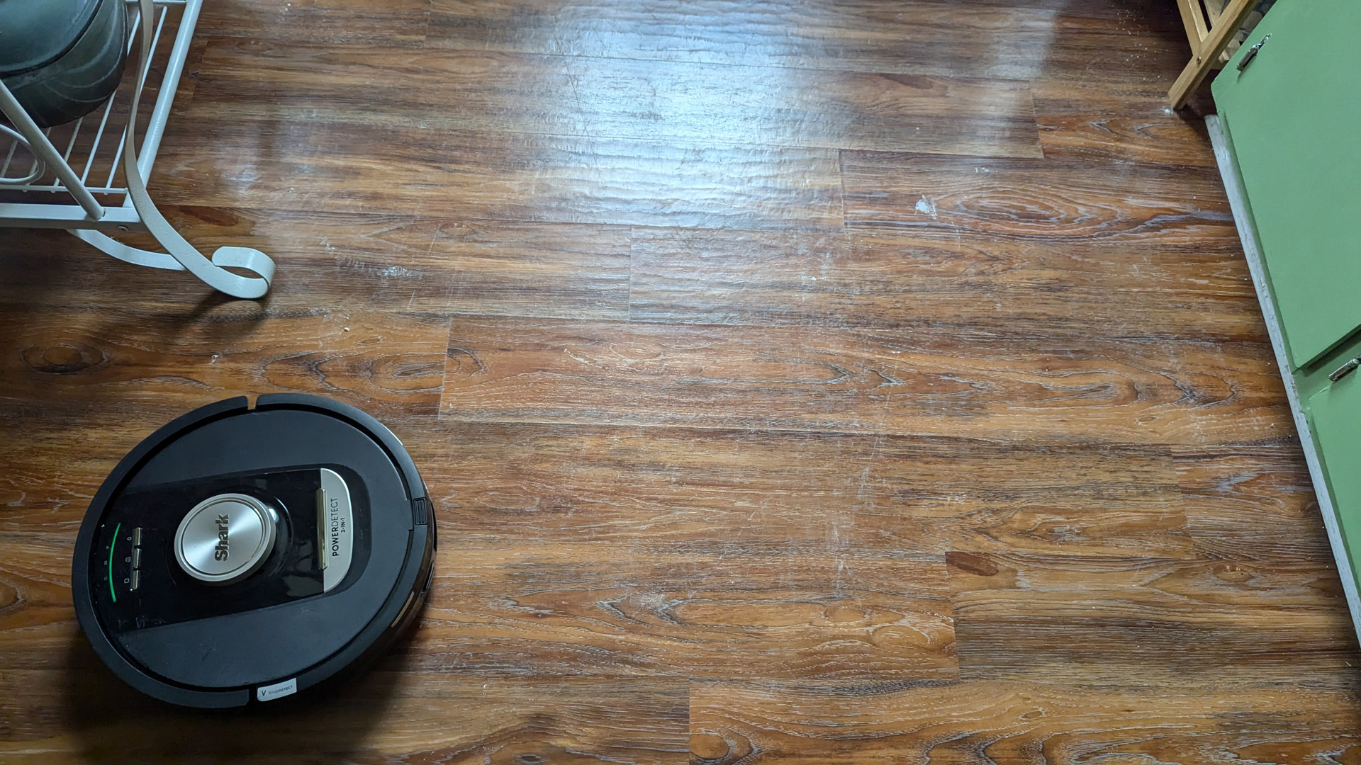 Results of the Shark PowerDetect Robot Vacuum and Mop cleaning a hard floor