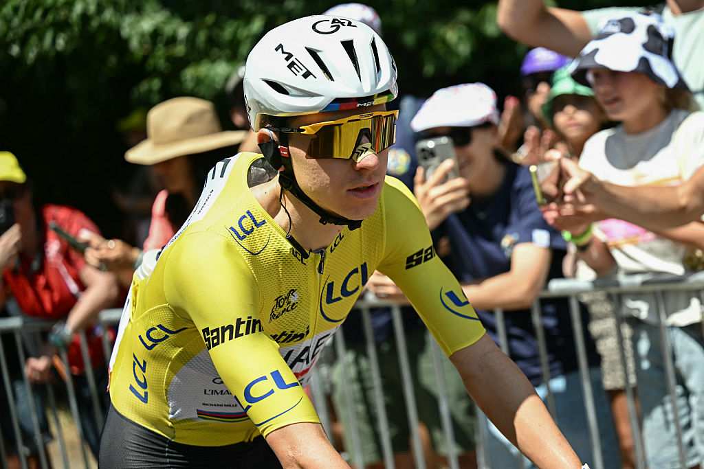UAE Team Emirates - XRG's Slovenian rider Tadej Pogacar wearing the overall leader's yellow jersey awaits the start of the 19th stage of the 113th edition of the Tour de France cycling race, 127,9 km between Gap and Alpe d'Huez in the French Alps, on July 24, 2026. (Photo by Loic VENANCE / AFP)