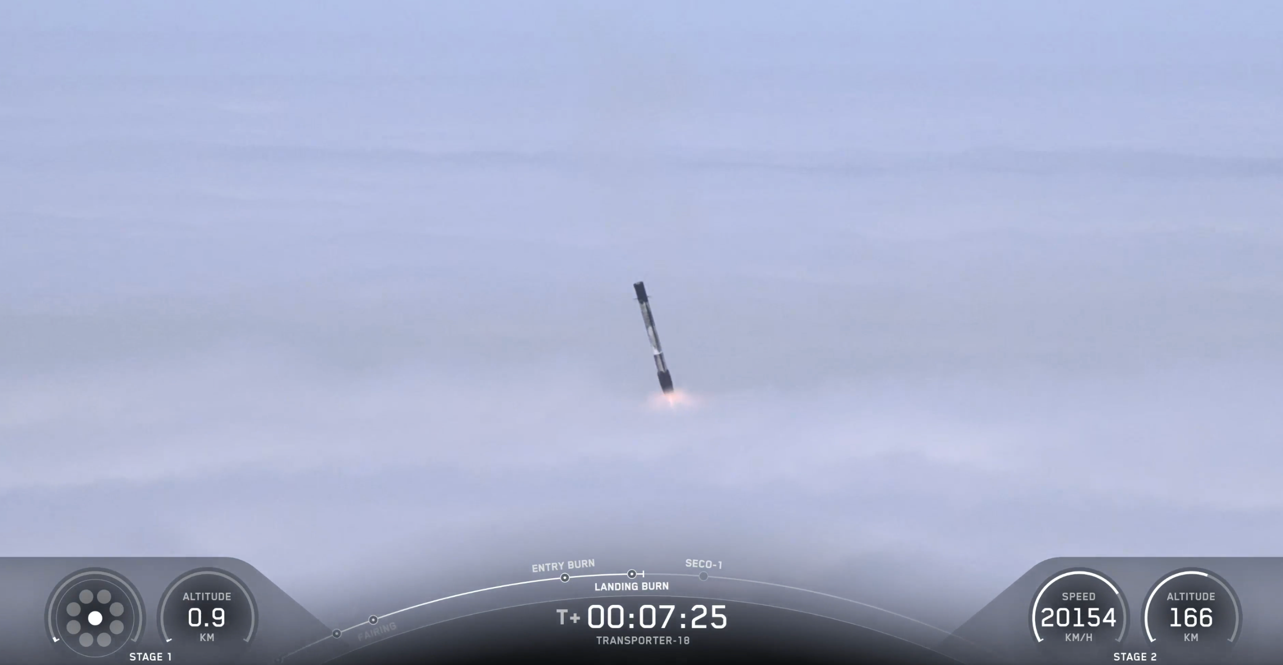 a black and white rocket begins its descent through a cloud layer