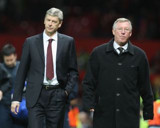 Arsenal manager Arsene Wenger and Manchester United boss Sir Alex Ferguson walk off after the Champions League semi-final first leg at Old Trafford in April 2009.