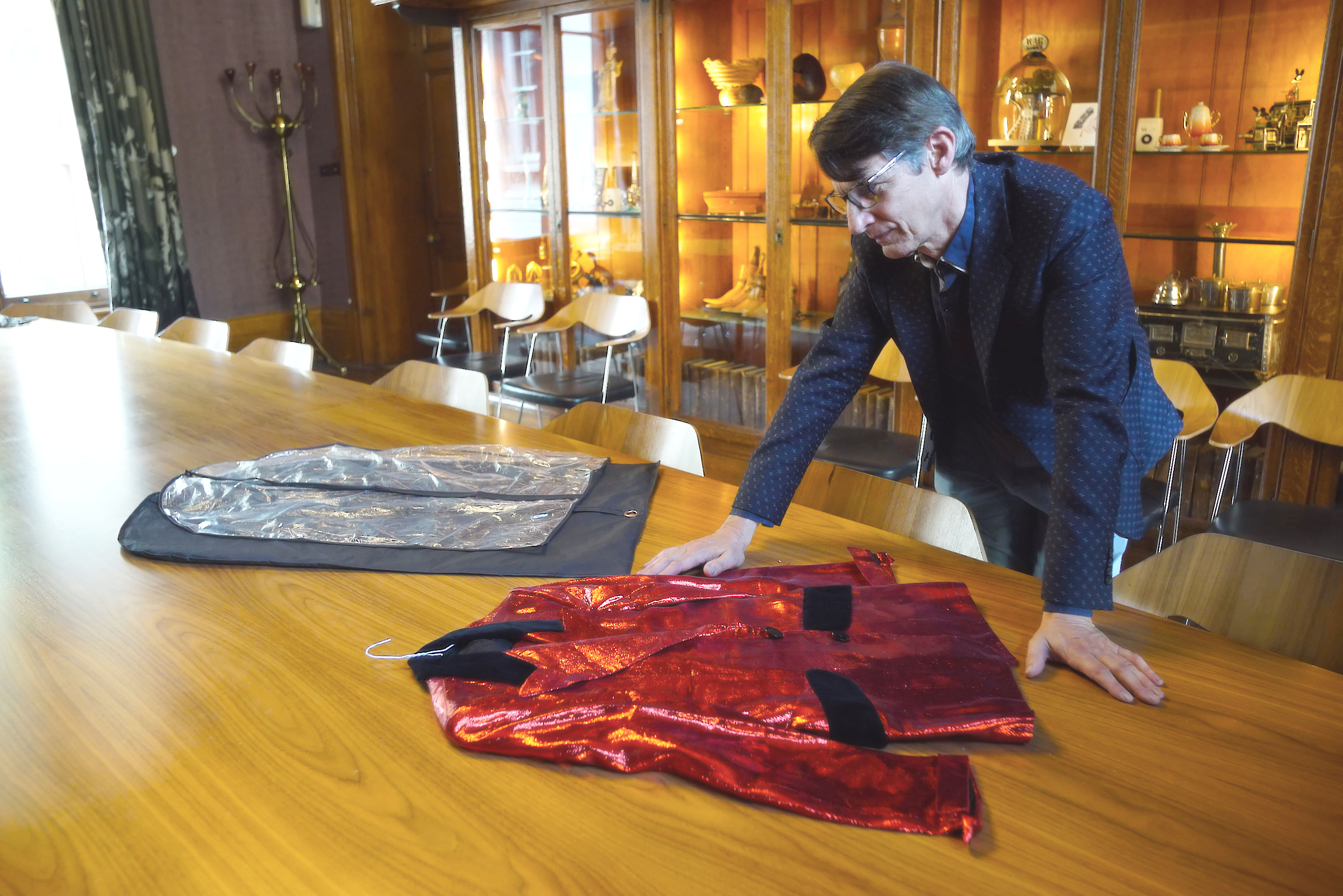 TV tonight: Museum director Geoff Marsh with Jim Lea's suit.