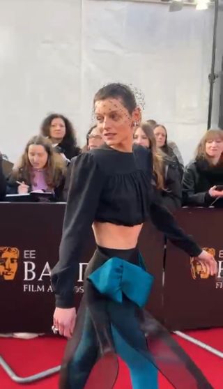 Emma Corrin at the 2024 EE BAFTA Film Awards