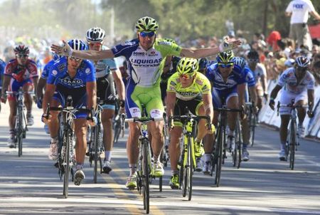 Elia Viviani (Liquigas-Cannondale) lifts his arms to celebrate a stage win