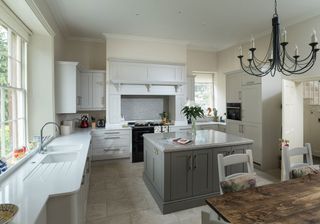 kitchen with white marble and dining table