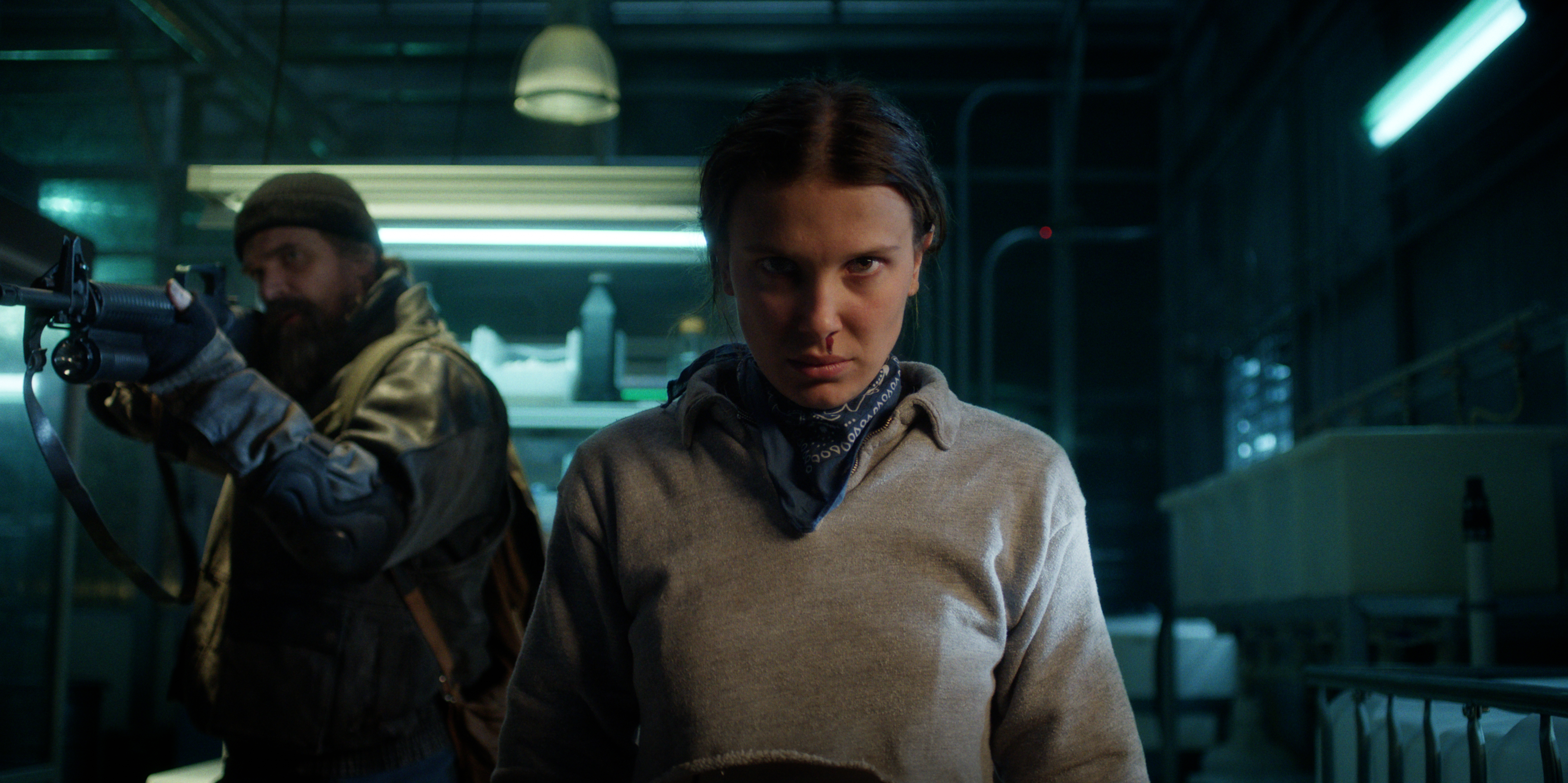 david harbour as hopper and millie bobby brown as eleven in a lab in stranger things season 5