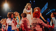 A still from Grease: The Immersive Movie Musical at Evolution London, Battersea Park