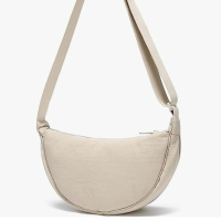 YIKOEE Crescent Bag 
RRP: $14.99
This Amazon crescent bag is available in a range of dreamy colors, including cream, pink and light grey and will cost you just under $15, as opposed to Uniqlo's $19.90.
Inside, it features two pouches, alongside the main compartment and an adjustable strap that can be worn over your body, or your shoulder.