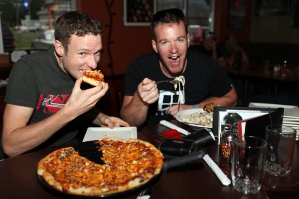 Elite Men World Champion Jason English (L) and thirrd placed 30-34 Men Adam Kelsall get in their carbo loading before the race.