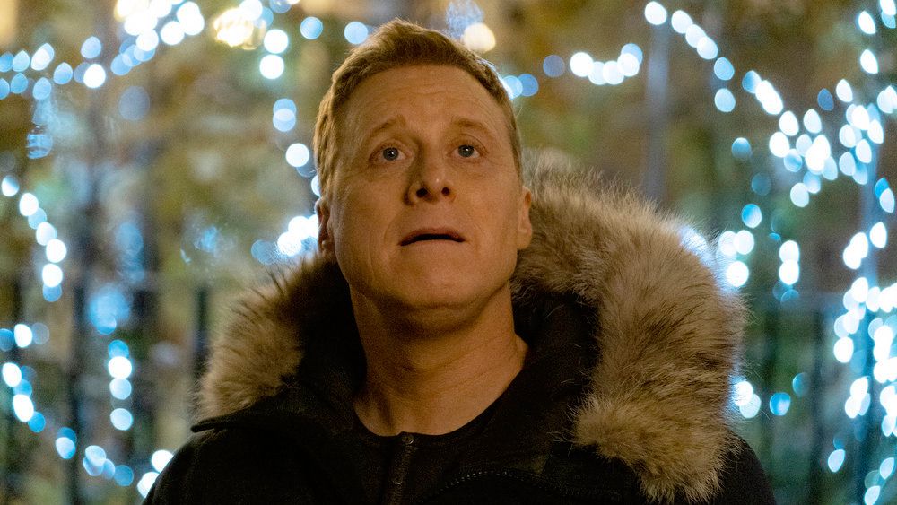 Harry Vanderspeigle (Alan Tudyk) looking upwards in &quot;Resident Alien&quot; season 3