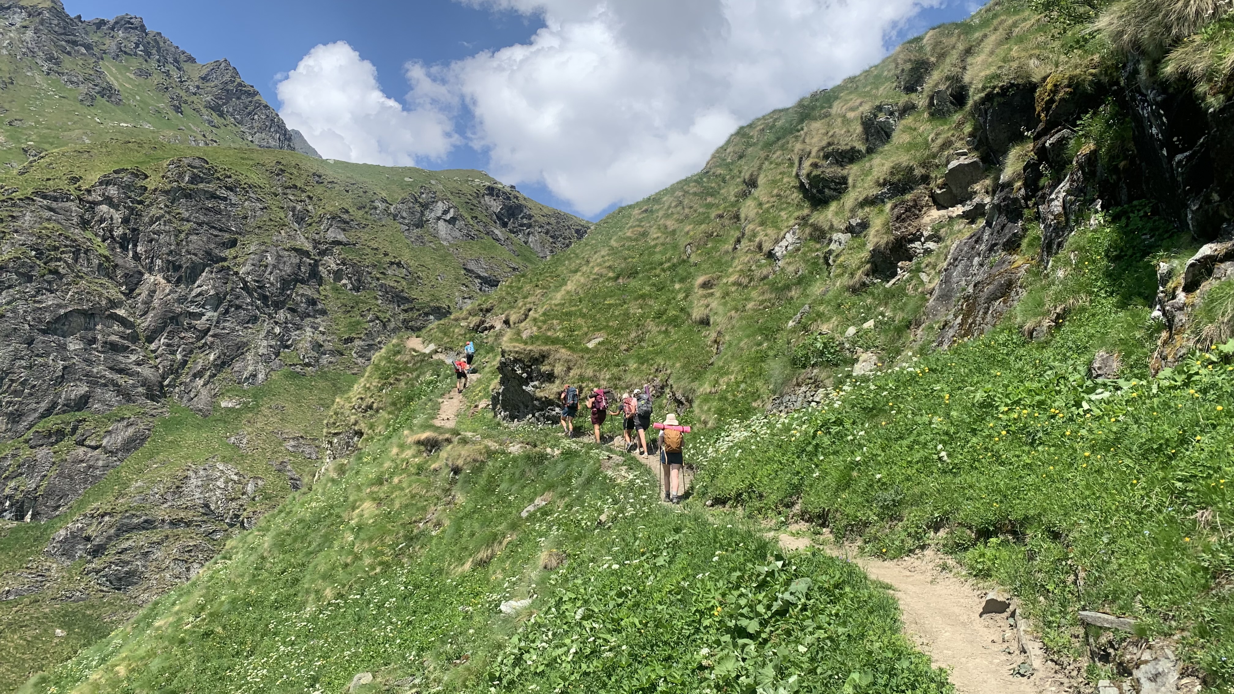 A group hiking in the Swiss Alps