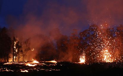 Hawaii's Kilauea volcano erupts violently.