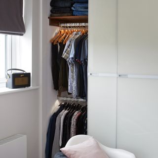 White wardrobe with double hanging rails