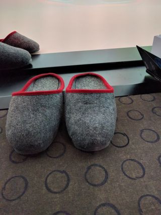 Everyone entering the half sphere must wear a set of slippers