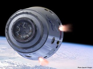An artist's illustration of SpaceX's Dragon space capsule in Earth orbit. 