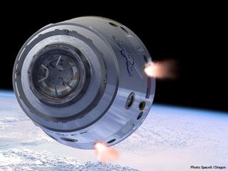 An artist's illustration of SpaceX's Dragon space capsule in Earth orbit.