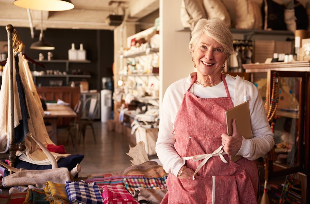 Portrait Of Female Owner Of Gift Store With Digital Tablet