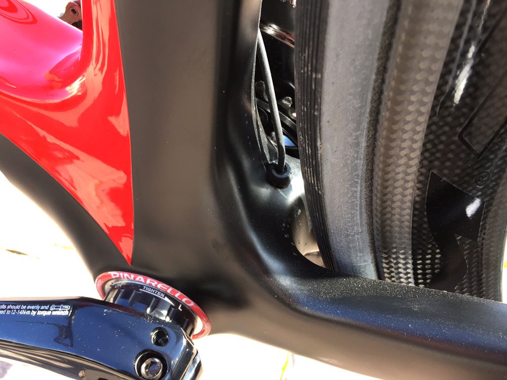 Behind the bottom bracket