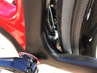 Behind the bottom bracket