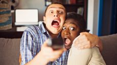 Couple scared while watching TV