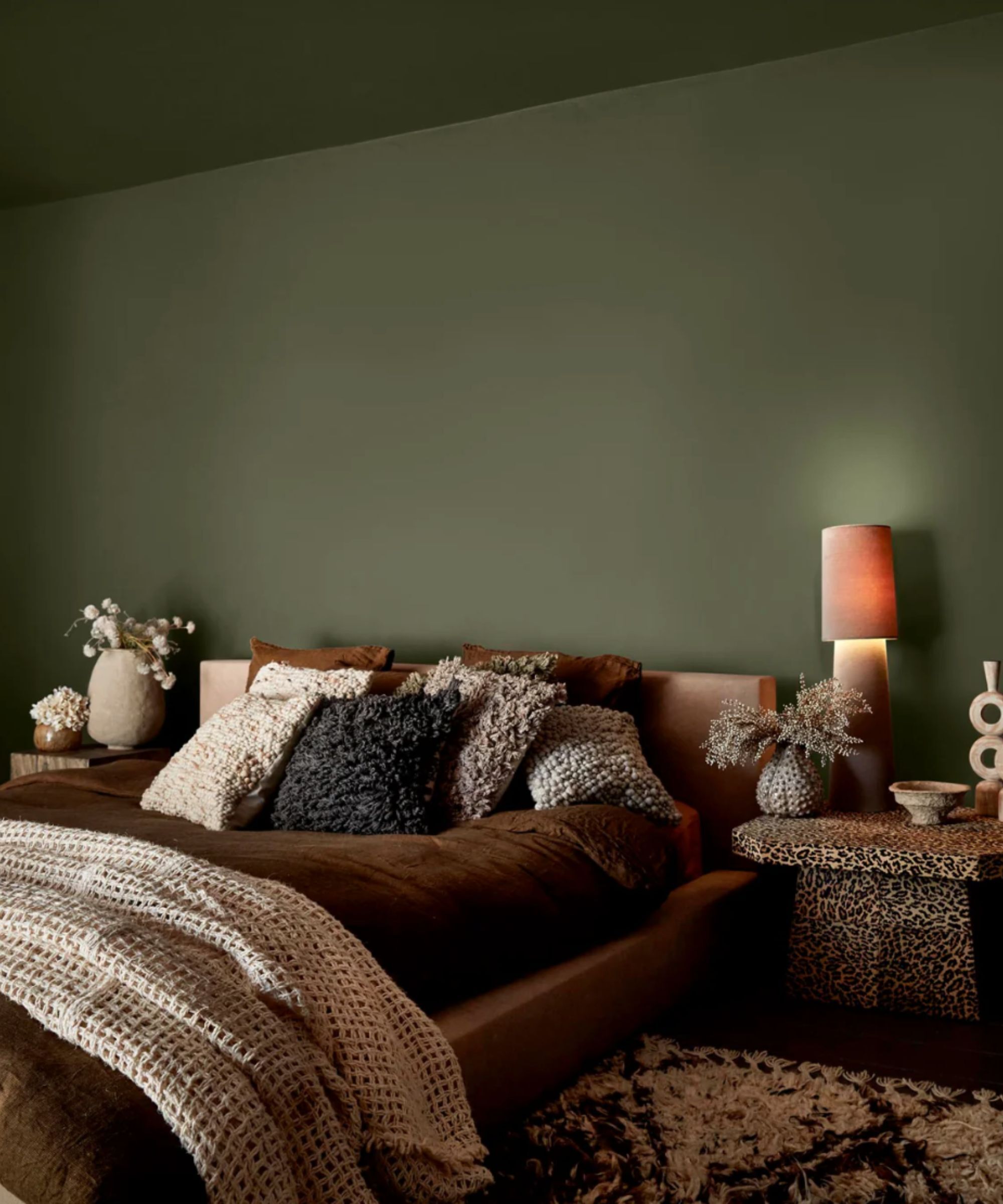 A dark green bedroom