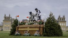 Laura Collett and Hester jump a cross-country fence in front of Blenheim Palace.