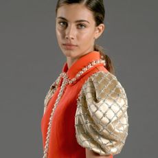 Elisa Visari wearing Upcycled by Miu Miu.