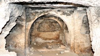 These Roman-era rock-cut chambers are part of a canyon.