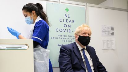 Boris Johnson during a visit to a vaccination centre in his Uxbridge constituency