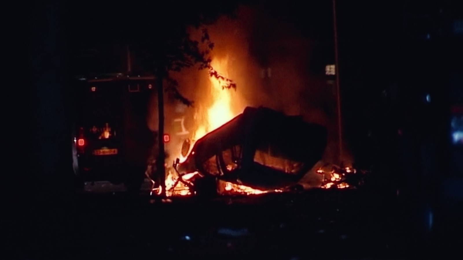 An upturned flaming car in Netflix's Trainwreck: The Real Project X.