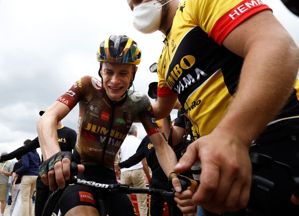JumboVisma teams Danish rider Jonas Vingegaard C reacts after winning the 11th stage of the 109th edition of the Tour de France cycling race 1517 km between Albertville and Col du Granon Serre Chevalier in the French Alps on July 13 2022 Photo by CHRISTIAN HARTMANN POOL AFP Photo by CHRISTIAN HARTMANNPOOLAFP via Getty Images